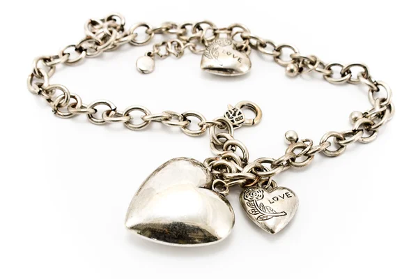 Silver necklace with heart pendants — Stock Photo, Image