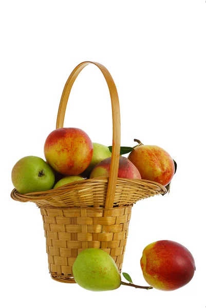 Fresh fruits in interwoven basket — Stock Photo, Image