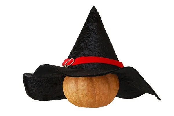 Kleine halloween pompoen in heks hoed — Stockfoto