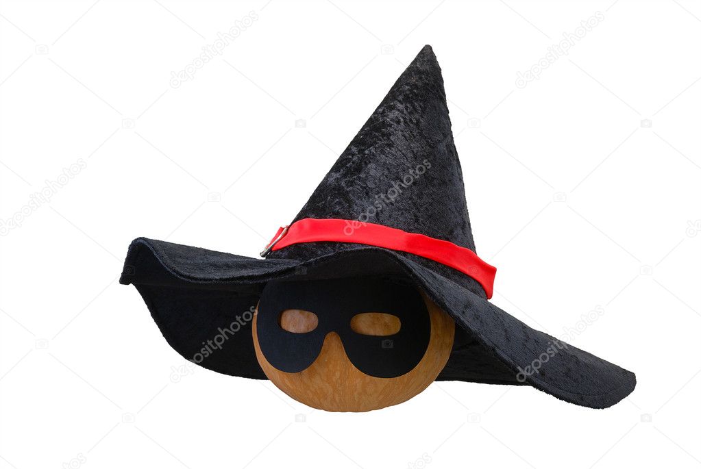 Halloween pumpkin in witch hat and black mask