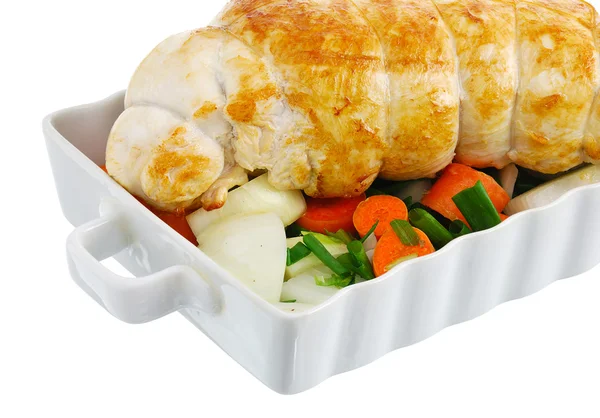 Crop of grilled turkey breast with vegetables on baking pan — Stock Photo, Image
