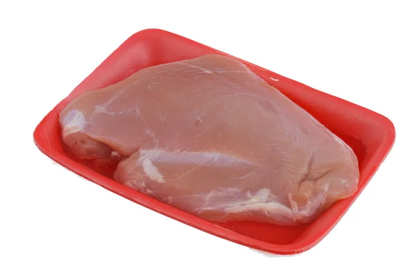 Raw turkey breast on orange foam meat tray — Stock Photo, Image