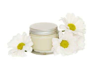 Jar with cream and camomile clipart