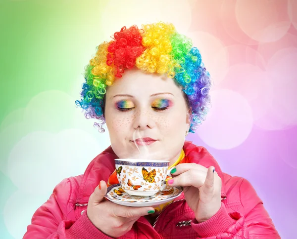 Rainbow Clown with cup of tea — Stock Photo, Image