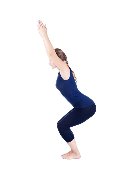 Yoga utkatasana stoel krachtige pose — Stockfoto