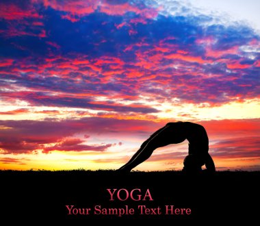 Yoga silhouette at sunset clipart