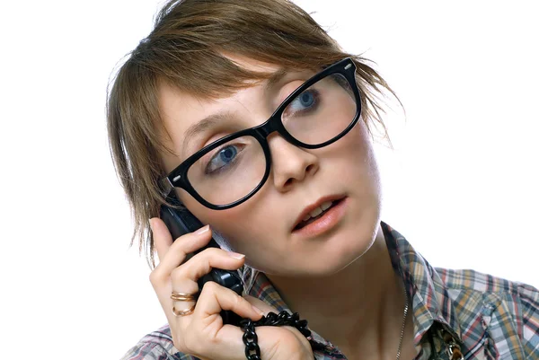 Hablando chica sostiene el teléfono —  Fotos de Stock