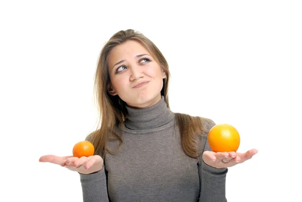 Mädchen mit Orangen — Stockfoto