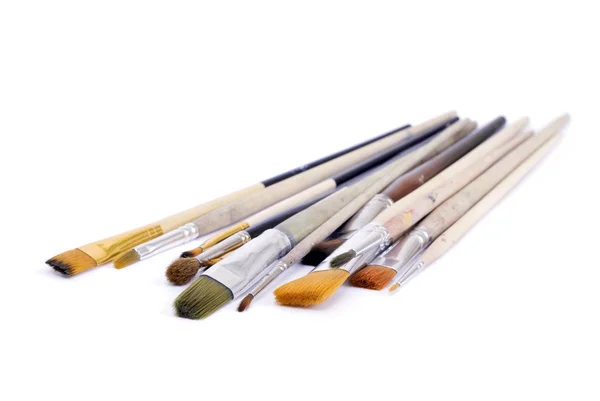 Beyaz üstüne sanatçı fırçalar — Stok fotoğraf