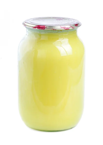 Miel en frasco de vidrio aislado — Foto de Stock