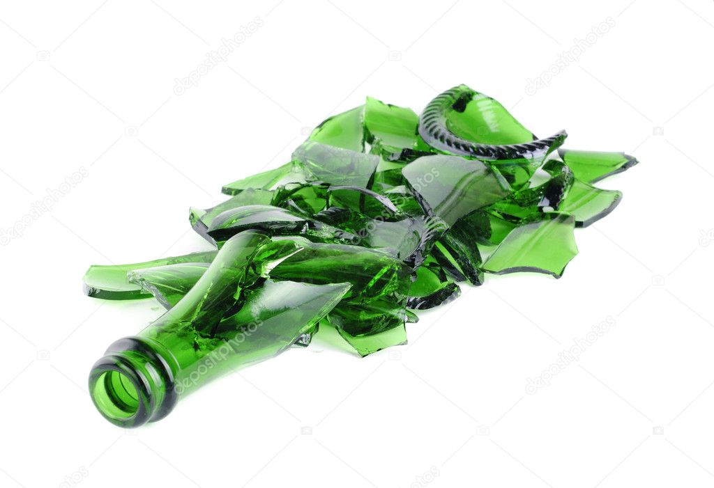 Shattered green champagne bottle isolated on the white background