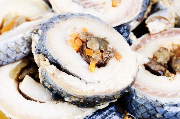 Korean rolls on slices of salt herring — Stock Photo, Image