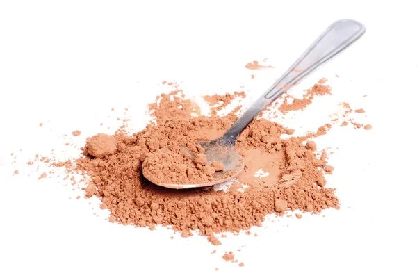 Cocoa powder and steel spoon isolation on white — Stock Photo, Image
