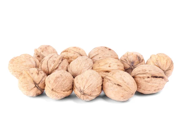 Some walnuts isolated on a white background — Stock Photo, Image