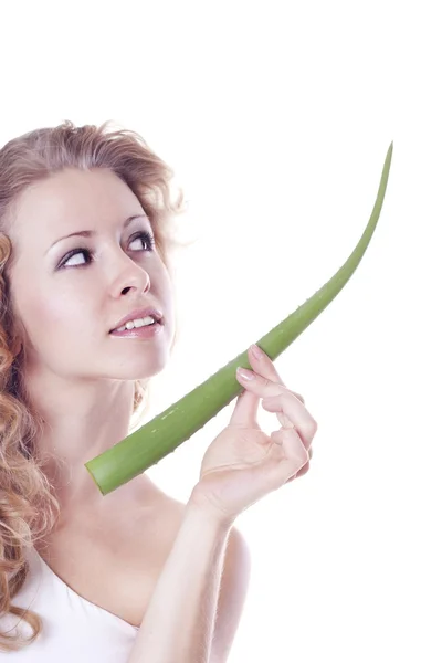 Beautiful young woman with aloe — Stock Photo, Image