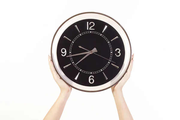 Woman’s hands holding clock — Stock Photo, Image