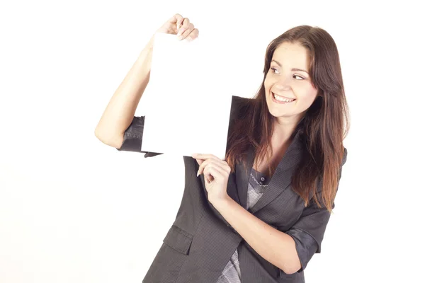 Young businesswoman holding empty blank — Stock Photo, Image