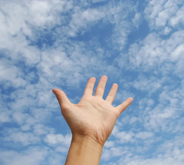 Ręka po niebie — Zdjęcie stockowe