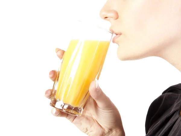 Young woman with a glass of juice — Stock Photo, Image