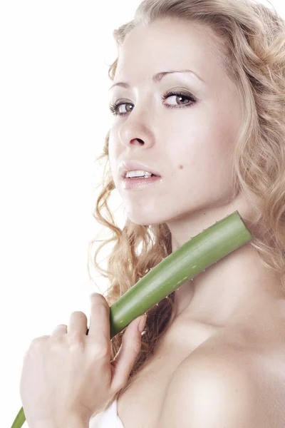 Beautiful blond young woman with aloe — Stock Photo, Image