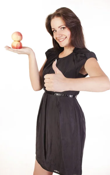 Młoda kobieta z jabłkami Wyświetlono ręka znak ok — Zdjęcie stockowe