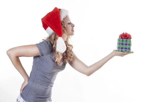 Pretty Santa girl with a present gift for New Year or Christmas — Stock Photo, Image