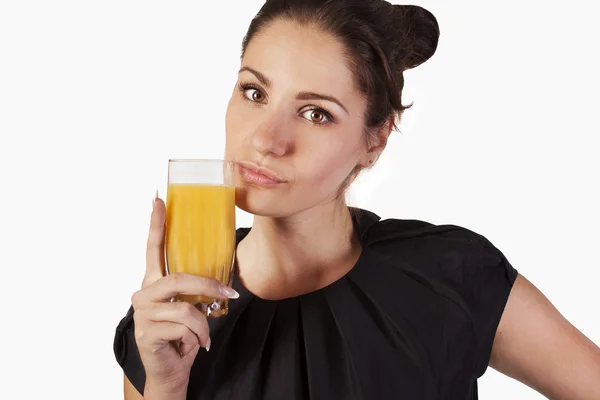 Mladá žena se sklenicí džusu — Stock fotografie