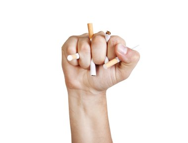 Man's hand crushing cigarettes clipart