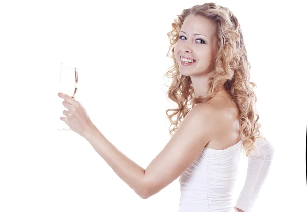 Mladá žena pití šampaňského — Stock fotografie