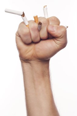 Man's hand crushing cigarettes clipart