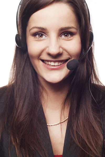 Kvinnelig operatør med hodetelefoner – stockfoto