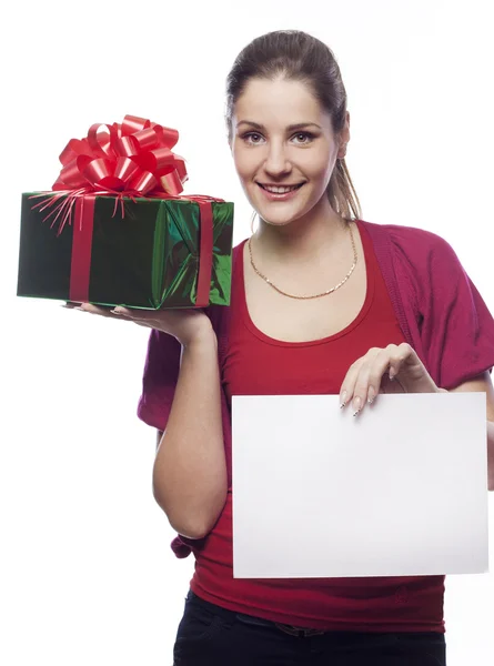 Young woman with present holding empty blank — Stock Photo, Image