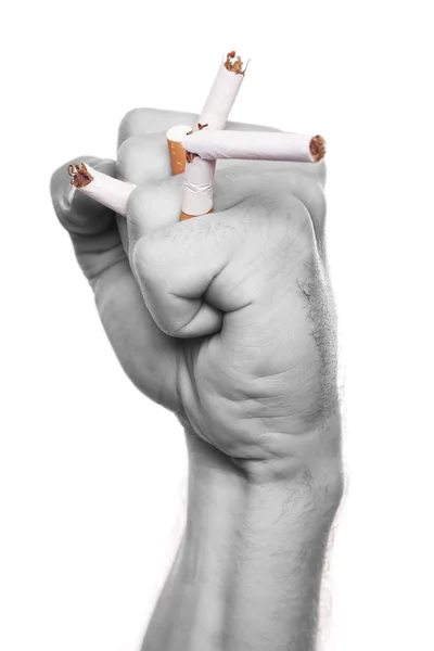 Mano de hombre aplastando cigarrillo — Foto de Stock