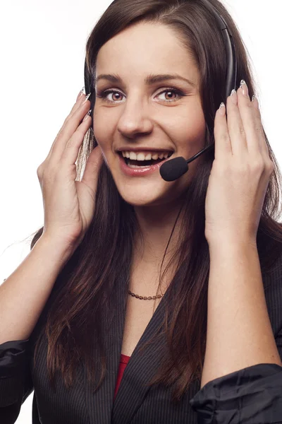 Kvinnelig operatør med hodetelefoner – stockfoto