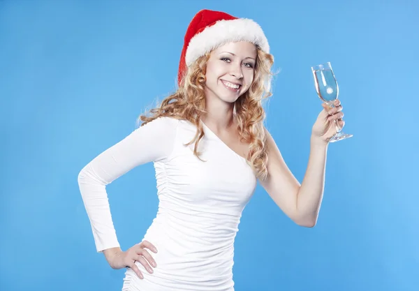 Young Santa girl drinking a champagne — Stock Photo, Image