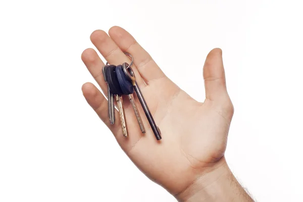 Ruka držící klíče — Stock fotografie