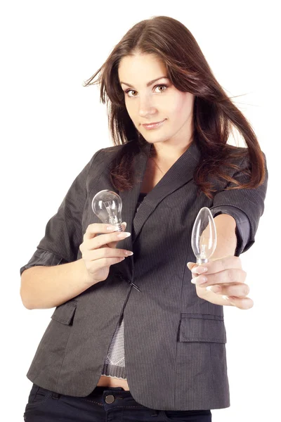 Businesswoman holding two bulbs — Stock Photo, Image