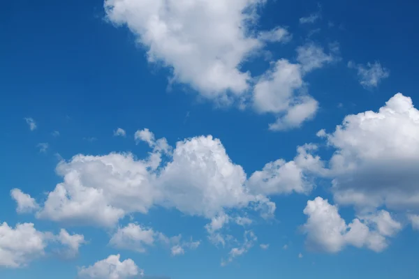 stock image Blue sky with white clouds on a warm summer day