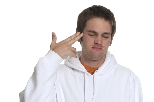 Teenage boy pointing to head — Stock Photo, Image
