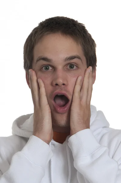 stock image Teenage boy looking shocked