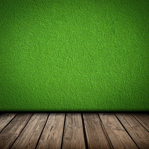 Groene muur en houten vloer interieur — Stockfoto