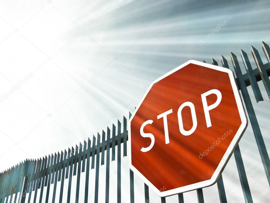 Stop sign on the gate