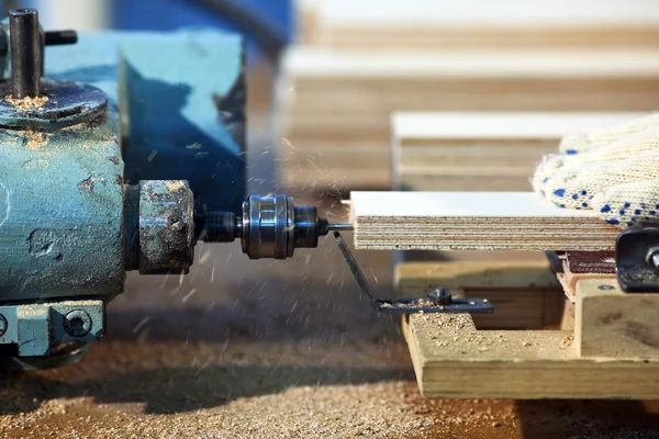 Drilling a plywood at wood factory — Stock Photo, Image