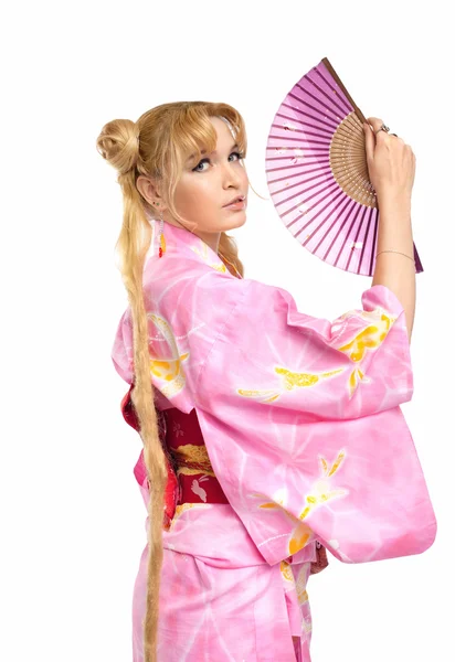 Mujer joven en traje de kimono con fantail — Foto de Stock