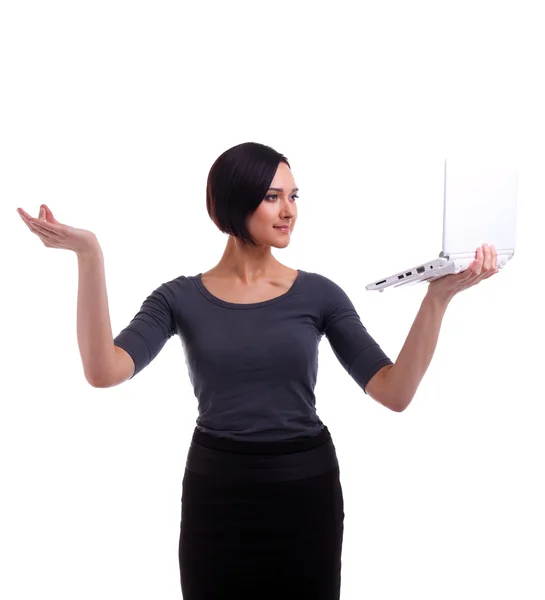 Equilibrio donna d'affari con computer portatile — Foto Stock