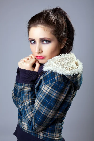 Beautiful sad girl portrait in jeans fur jacket — Stock Photo, Image