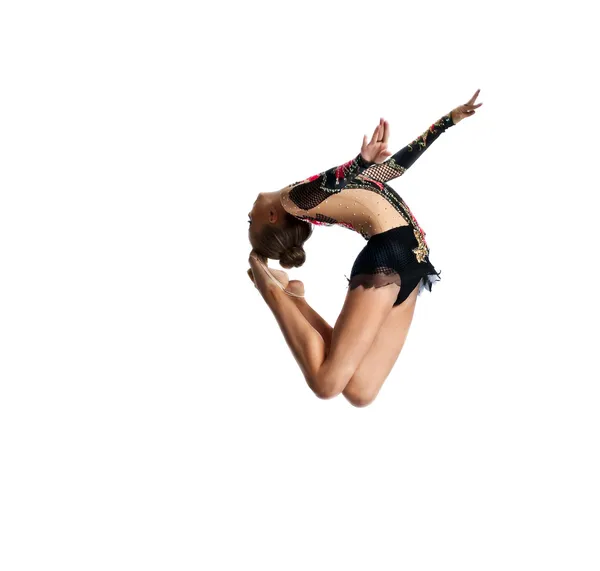 Jovem salto menina na ginástica dança — Fotografia de Stock