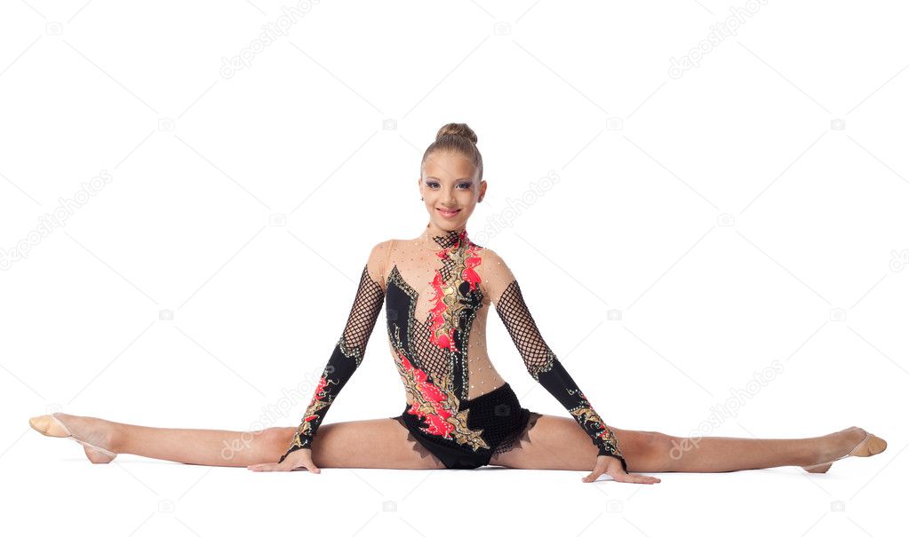 Young professional gymnast doing a splits isolated