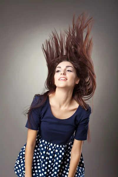 Beauty young woman retro style - hairs blow up — Stock Photo, Image