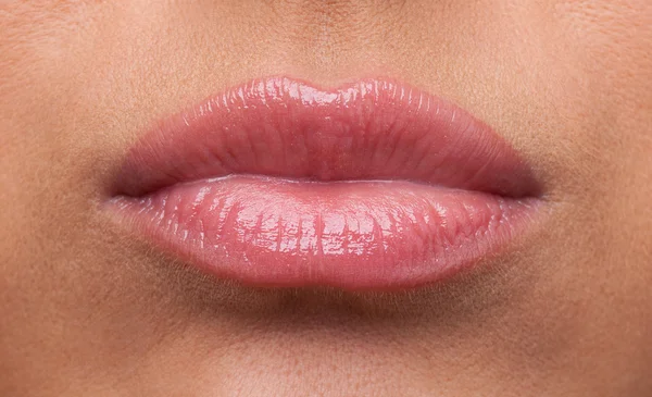 Beauty woman lips offended sulk close-up — Stockfoto